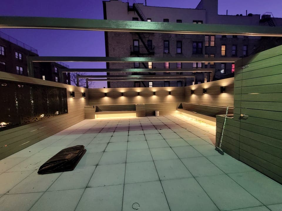 Crown Heights Rooftop — Modern facade and privacy fence