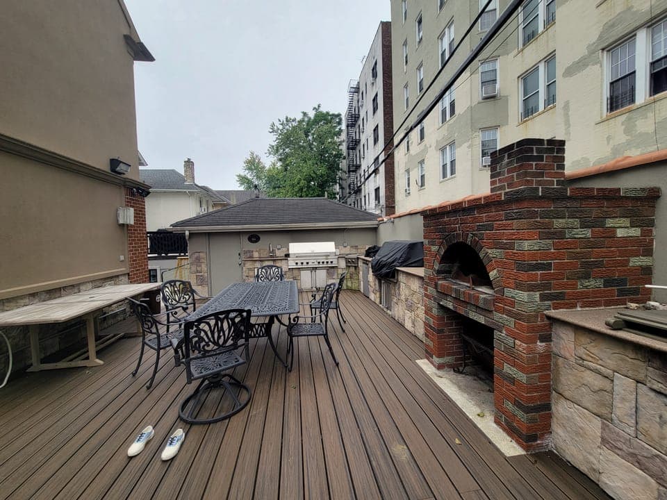 Rooftop Privacy Wall — Composite deck going down