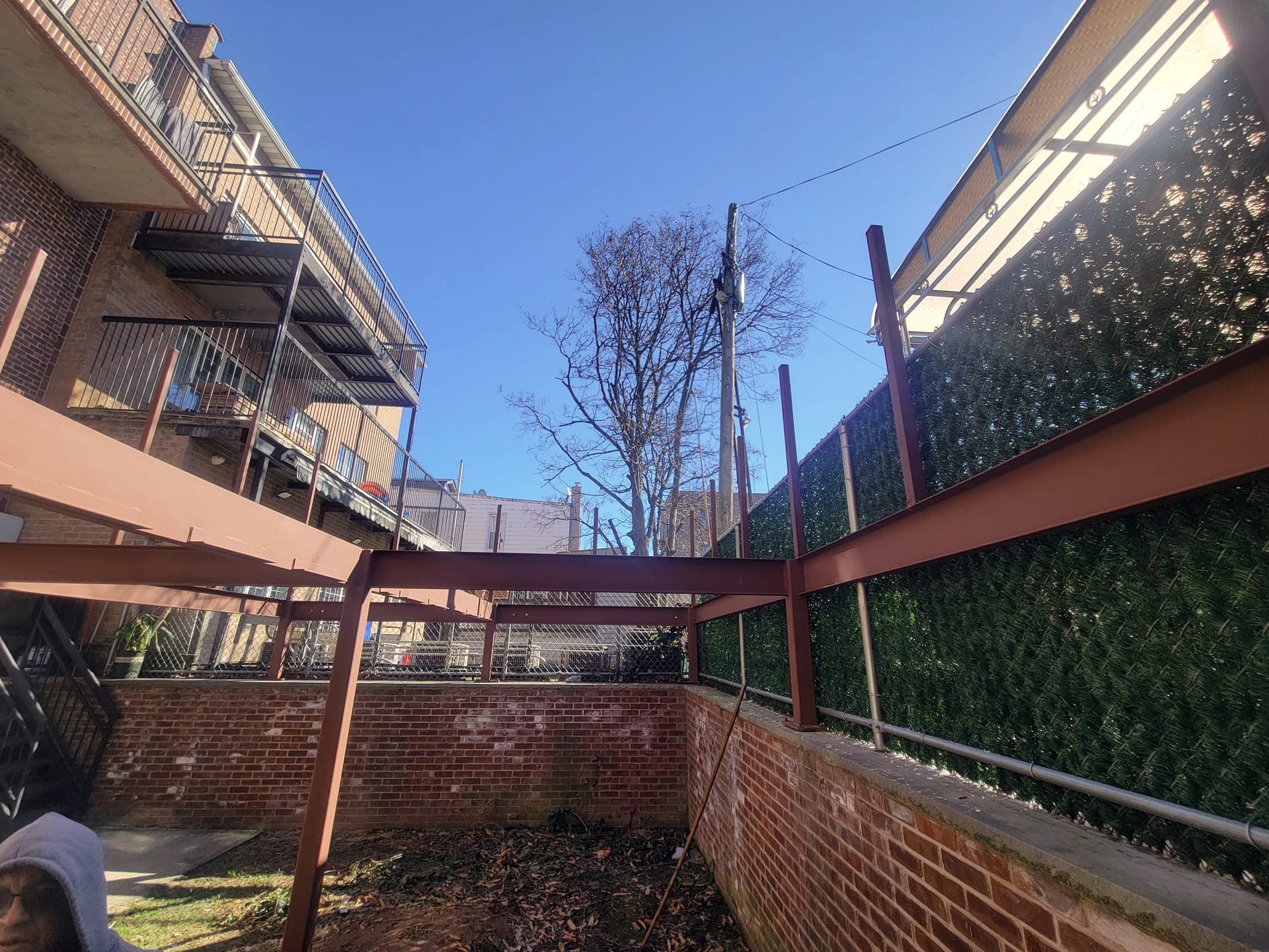 Sunset Park Rooftop Kitchen — Deck with kitchen and pizza oven